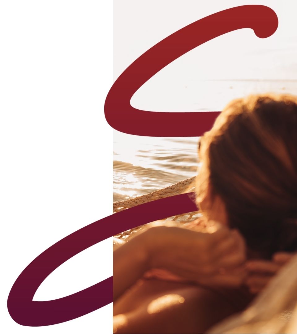 Tax Planner - Woman relaxing by the ocean